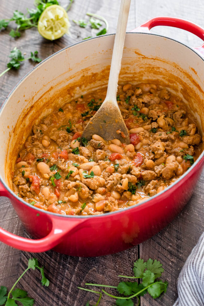 White bean and turkey chili in a Dutch oven.