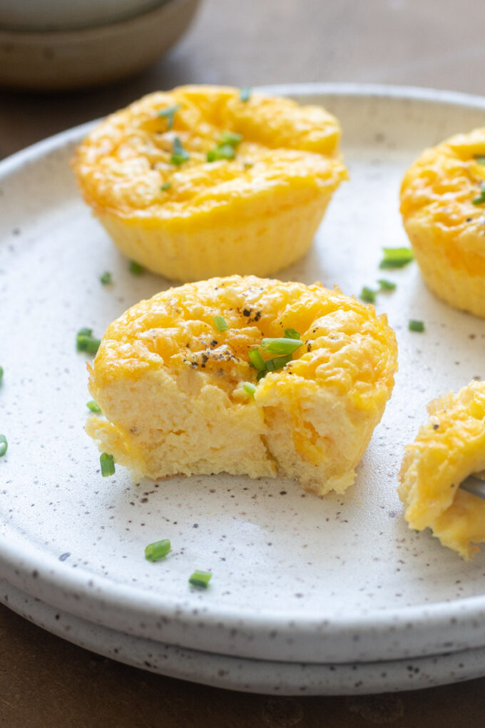 Close up of a soft and creamy cottage cheese egg bite showing the fluffy custardy center.
