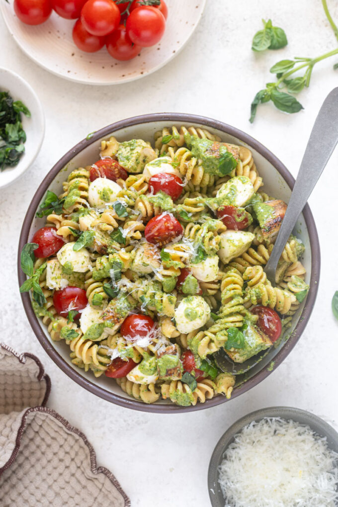 Protein pasta salad with chicken in a serving bowl.