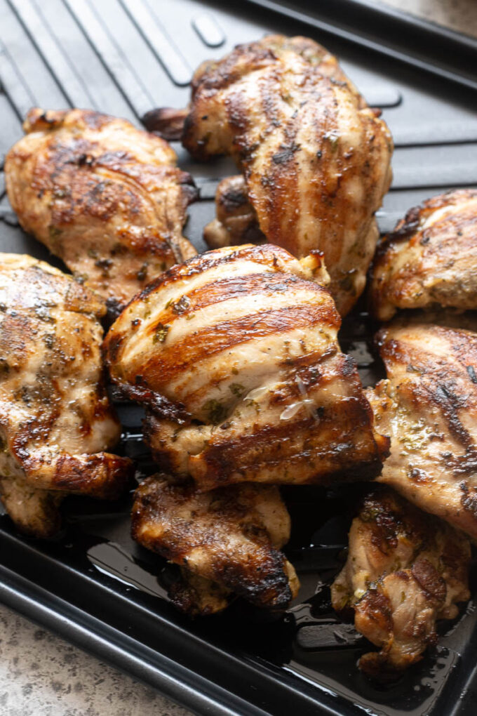 Cilantro lime grilled chicken resting on cutting board.