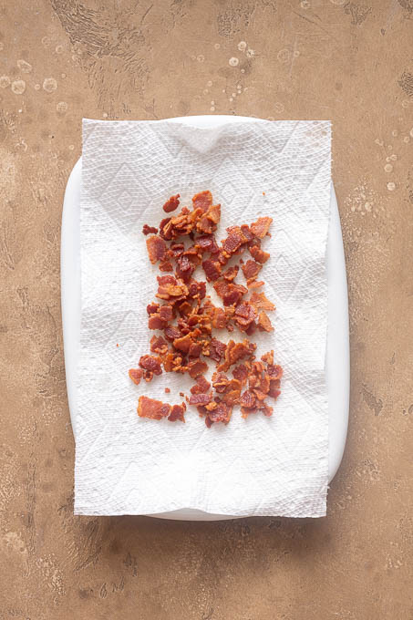 Cooked crumbled bacon for corn chowder.