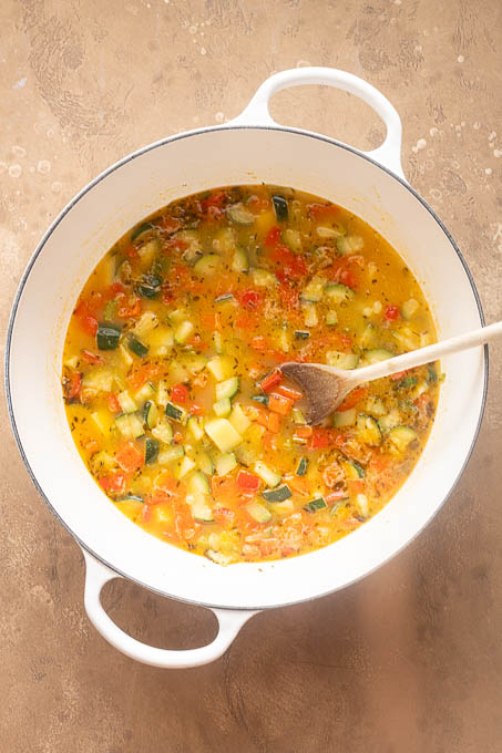 Corn chowder with broth and vegetables.