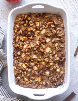 Overnight apple baked oatmeal in baking dish.