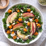 Fall harvest salad with kale, roasted butternut squash, apples, feta, cranberries and pepitas.