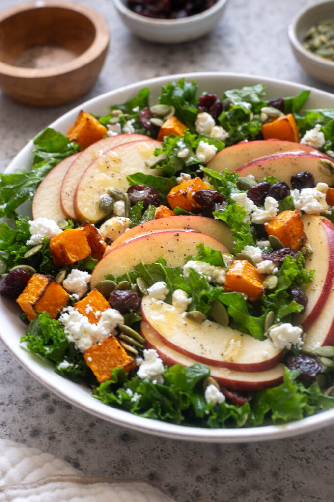 Kale and apple harvest salad with roasted butternut squash, cranberries and feta.